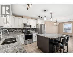 Laundry room - 406, 4574 51 Avenue, Olds, AB T4H0G3 Photo 6