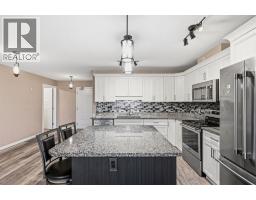 Living room - 406, 4574 51 Avenue, Olds, AB T4H0G3 Photo 7