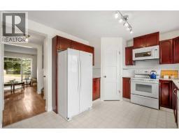 91 Hidden Crescent Nw, Calgary, AB T3A5L4 Photo 11