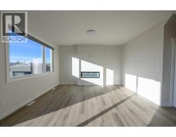 Living room/Dining room - 12818 87a Street, Grande Prairie, AB T8X0X7 Photo 15