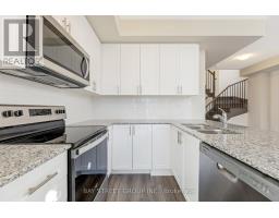 Bedroom 3 - 111 - 1573 Rose Way, Milton, ON L9E1N4 Photo 6