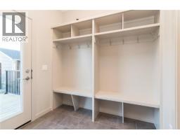 Laundry room - 504 Kitstone Gate, Carstairs, AB T0M0N0 Photo 7