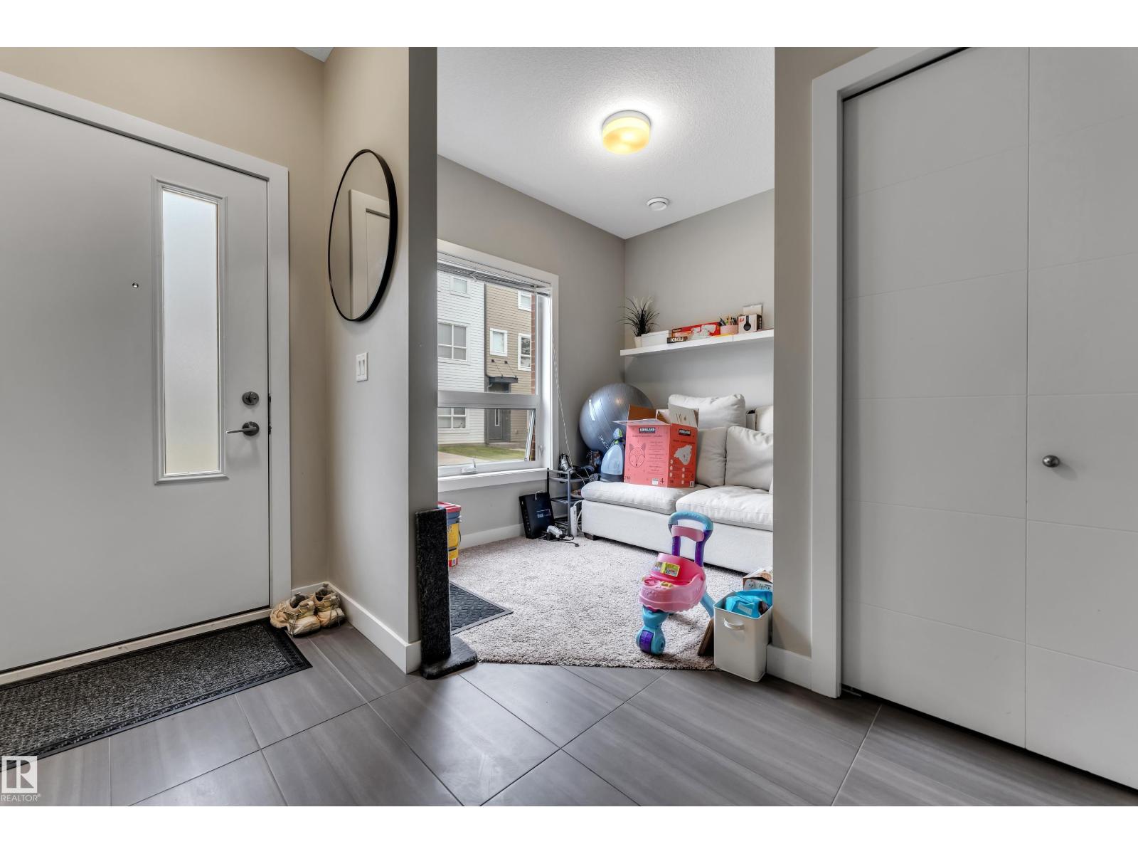 #126 – 2560 Pegasus Boulevard NW, Griesbach — photo 4 of 29: Property photo