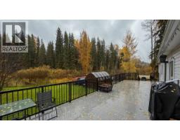 Primary bedroom of 8898 OLD SUMMIT LAKE ROAD · Prince George, BC