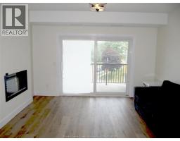 Living room/Fireplace - 7887 Edgar Unit# 303, Windsor, ON N8S3M9 Photo 8