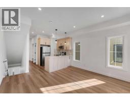 Bedroom - 210, 156 Park Street, Cochrane, AB T4C3H3 Photo 6