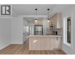203, 156 Park Street, Cochrane, AB T4C3H3 Photo 11