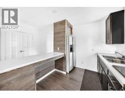 Living room/Dining room - 308, 3223 83 Street Nw, Calgary, AB T3B5N8 Photo 9
