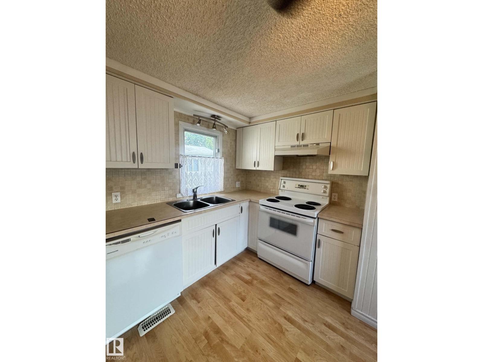 2415 West Oak Way NW, Westview Village — photo 4 of 23: Property photo