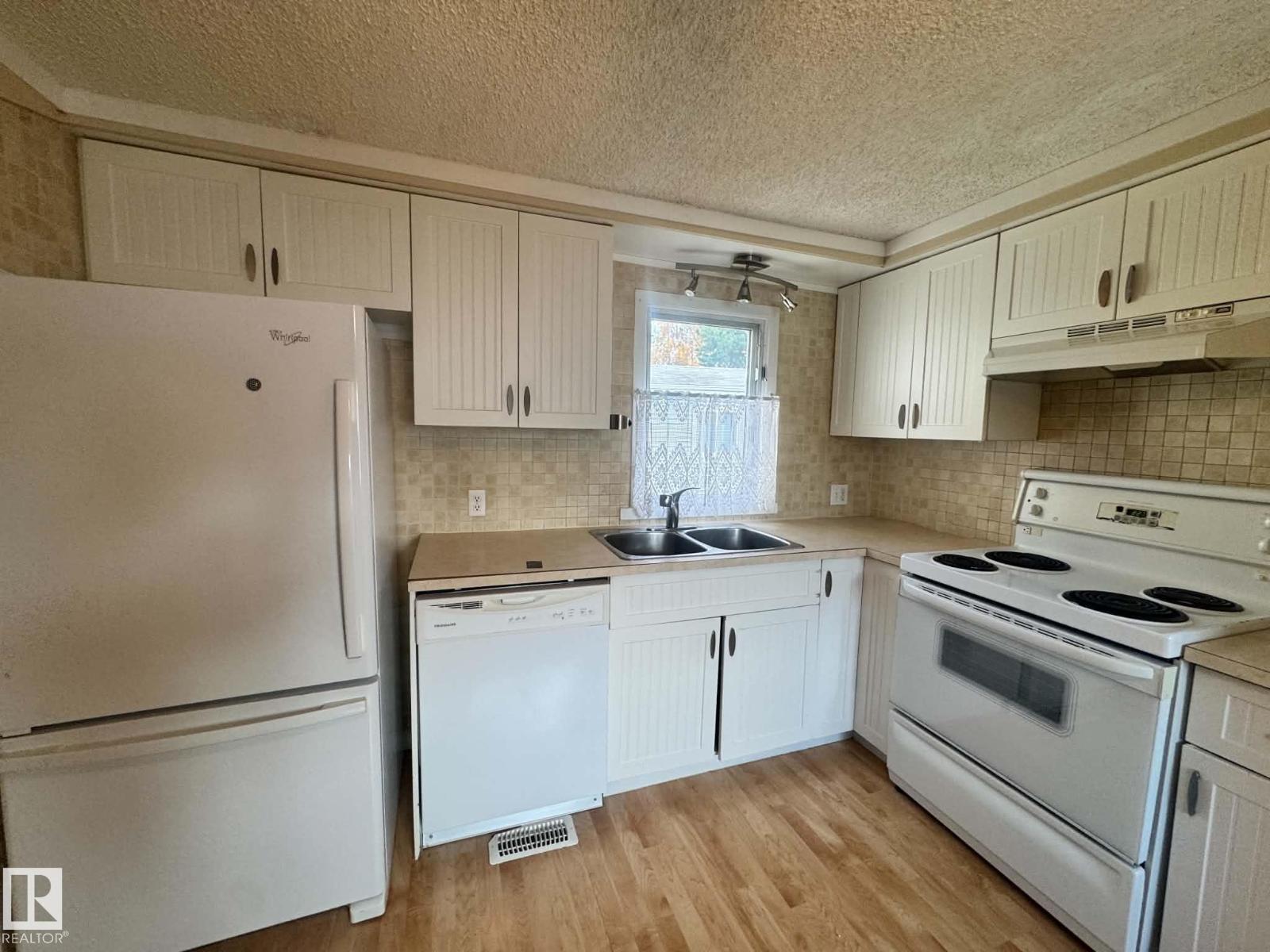 2415 West Oak Way NW, Westview Village — photo 5 of 23: Property photo