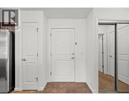 Living room - 1211, 310 Mckenzie Towne Gate Se, Calgary, AB T2Z1A6 Photo 7