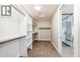 Laundry room - 386 Spring Creek Circle Sw, Calgary, AB T3H6G4 Photo 16