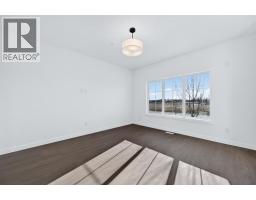 Laundry room - 46 Prince Drive Se, Rural Rocky View County, AB T1X2J1 Photo 11