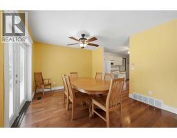 Family room - 110, 28342 Township Road 384, Rural Red Deer County, AB T0C0J0 Photo 12