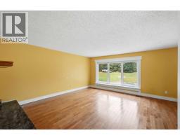 Living room - 110, 28342 Township Road 384, Rural Red Deer County, AB T0C0J0 Photo 10