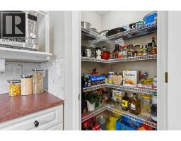 Laundry room - 436 Rocky Ridge Bay Nw, Calgary, AB T3G4H8 Photo 11
