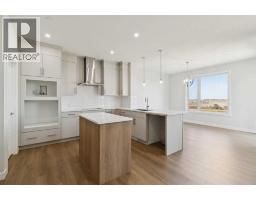 426 Hotchkiss Manor Se, Calgary, AB T3S0J9 Photo 12