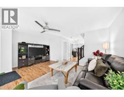 Living room - 523 Auburn Bay Avenue Se, Calgary, AB T3M1T1 Photo 7
