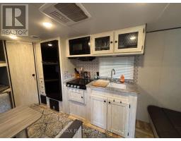 242 - 85 Theme Park Drive, Wasaga Beach, ON L9Z1X7 Photo 8