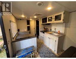 242 - 85 Theme Park Drive, Wasaga Beach, ON L9Z1X7 Photo 9