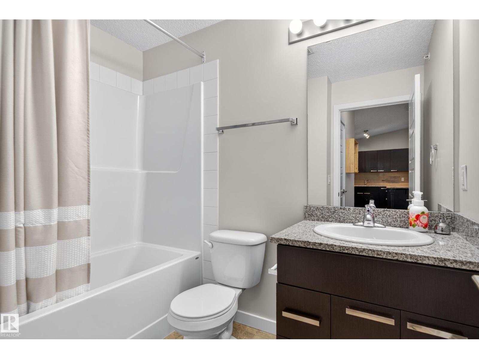 #401 14808 125 ST NW photo 20