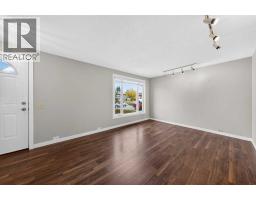 Primary Bedroom - 255 Huntridge Way Ne, Calgary, AB T2K4C4 Photo 6