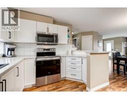 131 Tuscany Ridge Terrace Nw, Calgary, AB T3L3A6 Photo 24