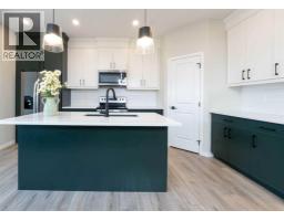 Kitchen - 321 Ellen Park, Crossfield, AB T0M0S0 Photo 6
