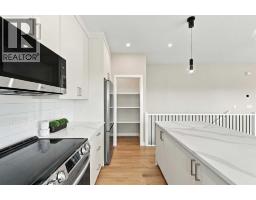 Laundry room - 321 Flare Avenue, Diamond Valley, AB T0L2A0 Photo 11