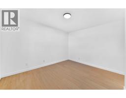 Bedroom - 911 Penmeadows Road Se, Calgary, AB T2H3R1 Photo 17