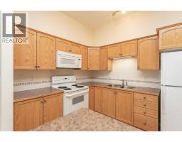 Kitchen - 105, 4425 Heritage Way, Lacombe, AB T4L2P4 Photo 6