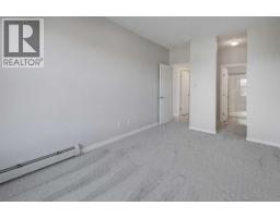 307, 207 Sunset Drive, Cochrane, AB T4C0H7 Photo 17
