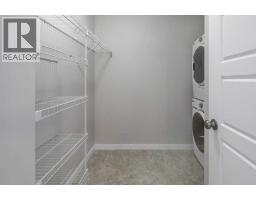 307, 207 Sunset Drive, Cochrane, AB T4C0H7 Photo 23