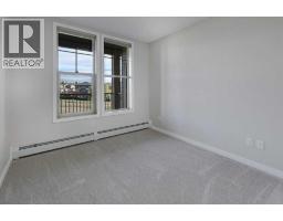 307, 207 Sunset Drive, Cochrane, AB T4C0H7 Photo 20