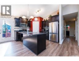 Family room - 604 Regier Place, Martensville, SK S0K0A2 Photo 9