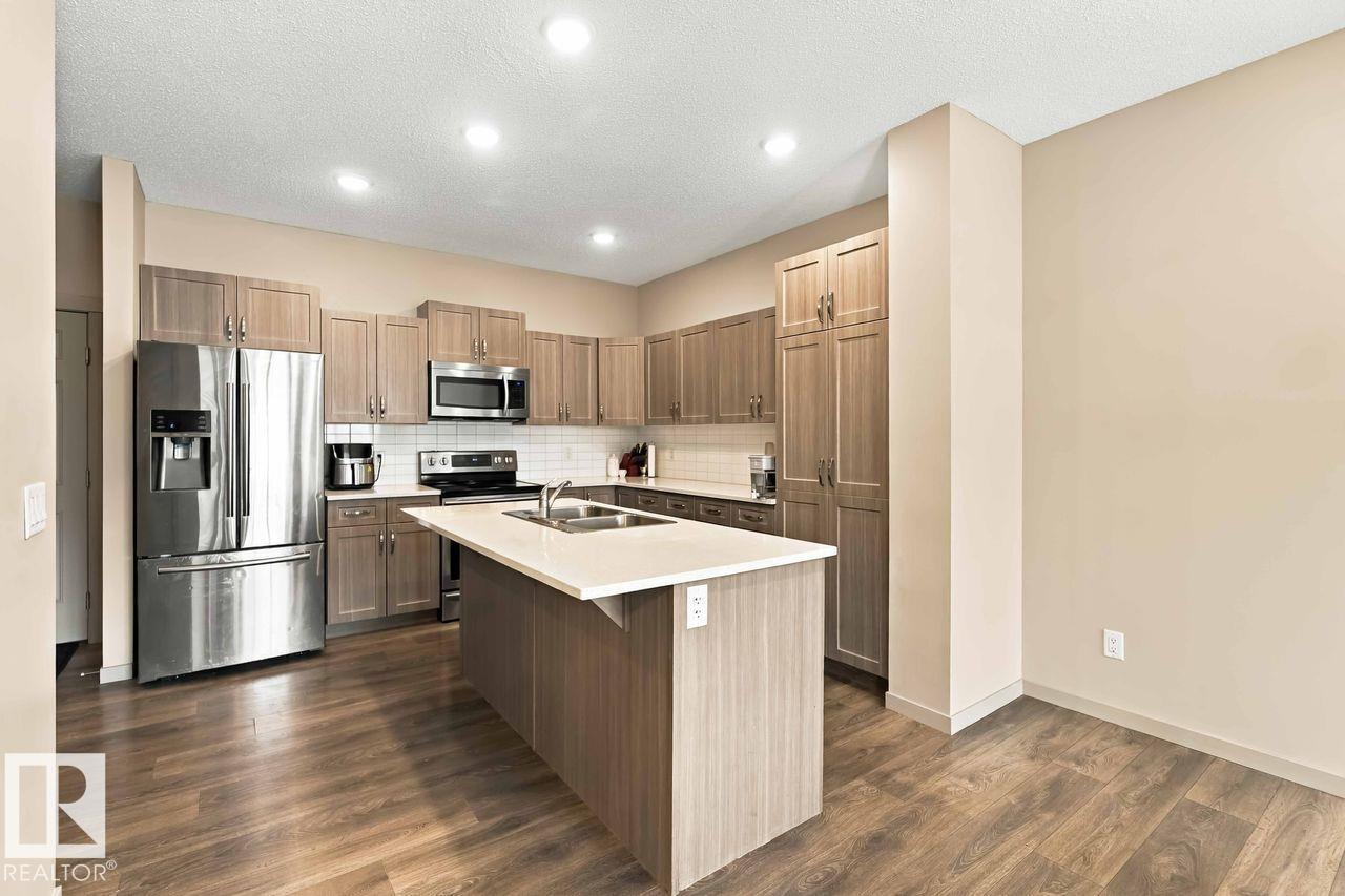 1416 26 Avenue NW, Tamarack — photo 10 of 30: Property photo