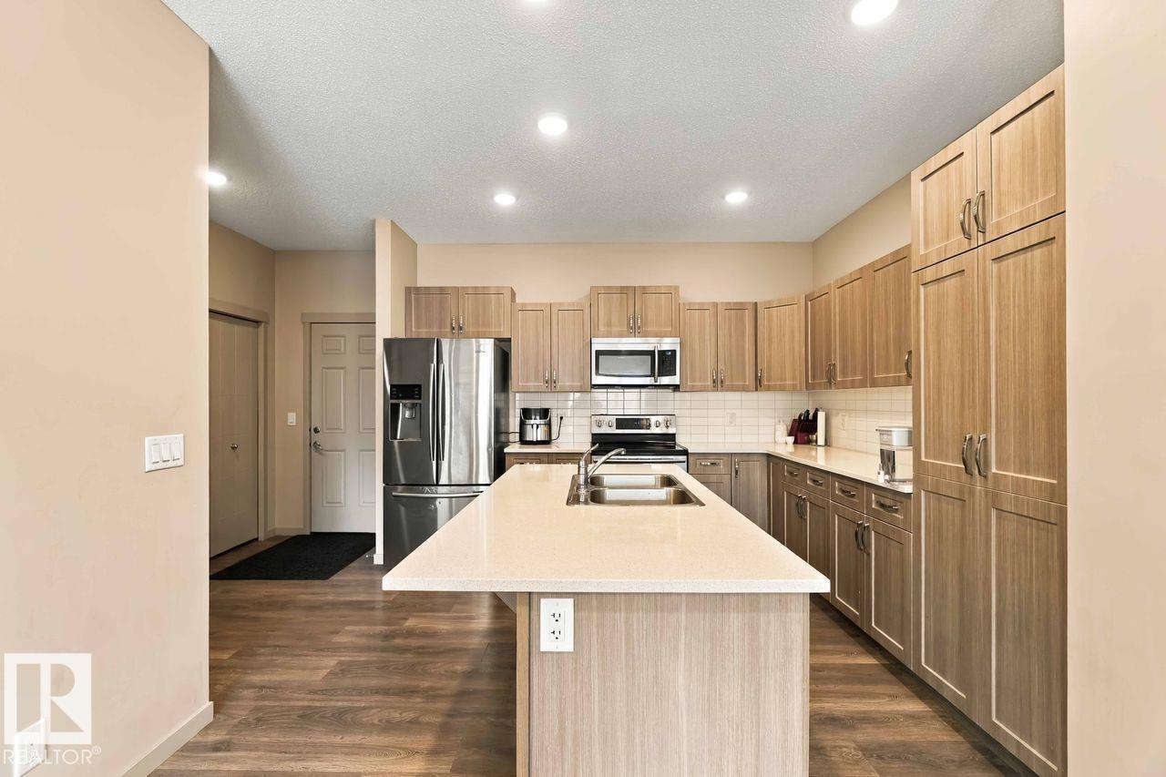 1416 26 Avenue NW, Tamarack — photo 11 of 30: Property photo