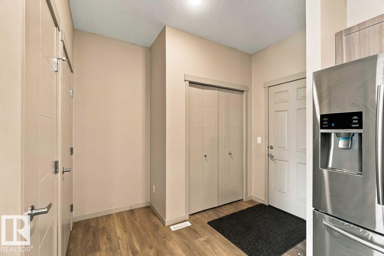 1416 26 Avenue NW, Tamarack — photo 12 of 30: Property photo
