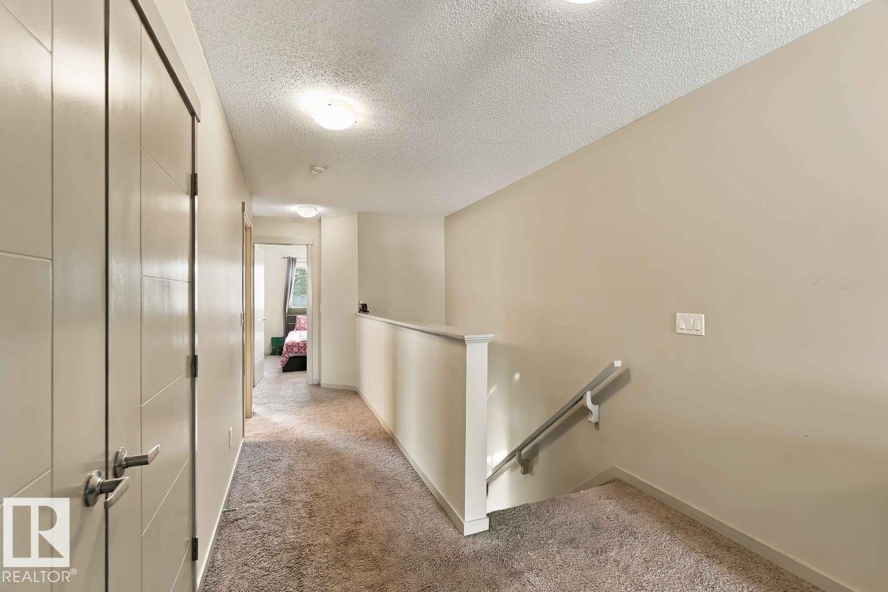 1416 26 Avenue NW, Tamarack — photo 20 of 30: Property photo