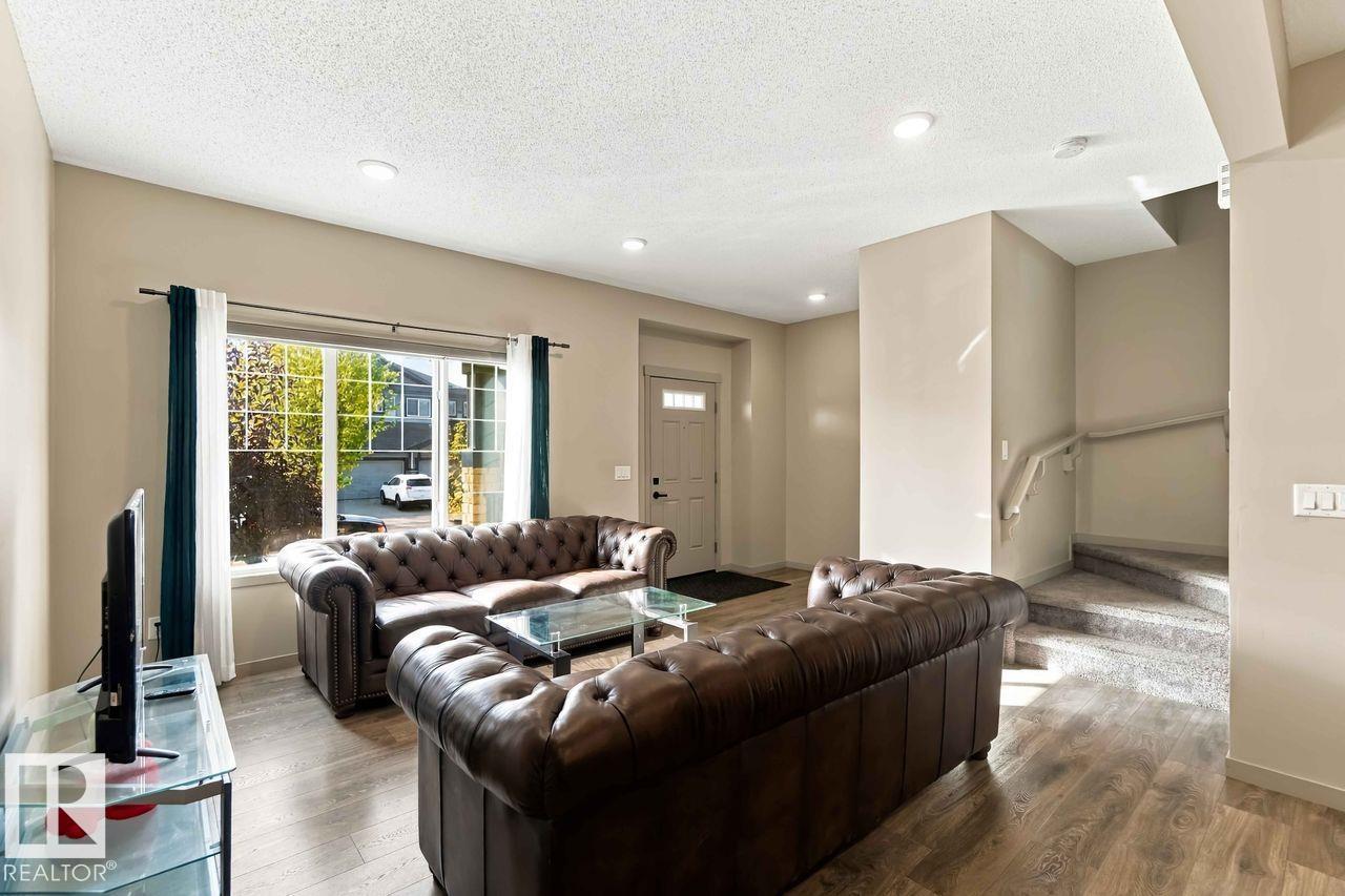 1416 26 Avenue NW, Tamarack — photo 8 of 30: Property photo