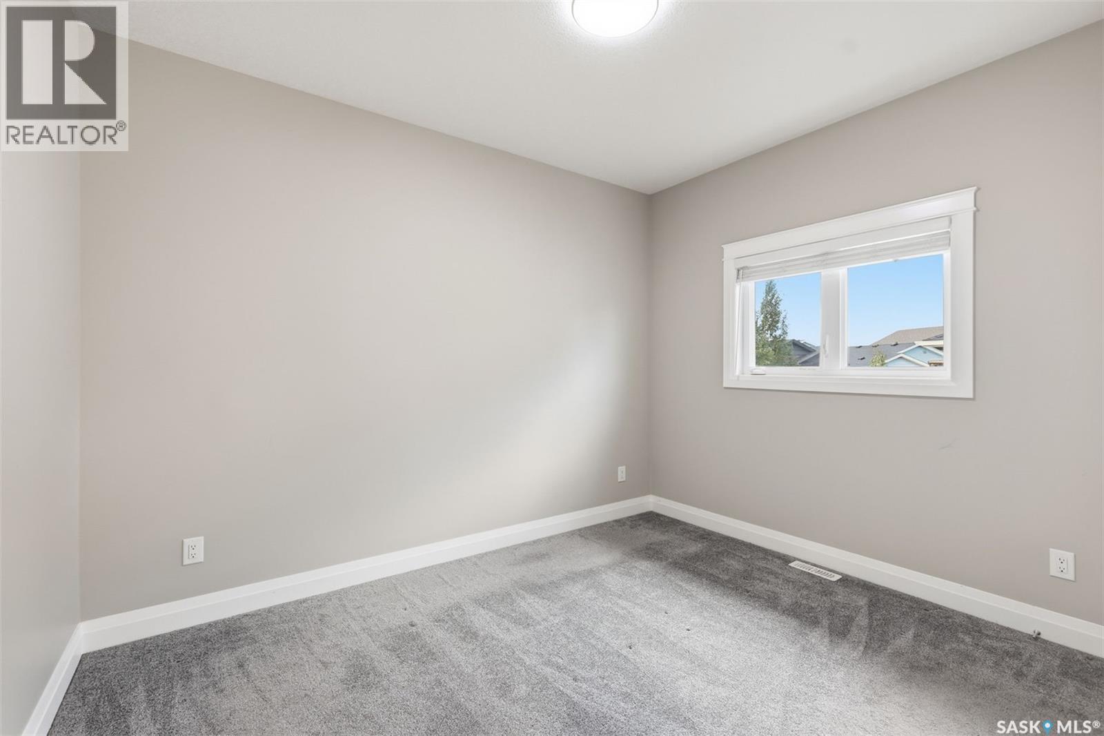 203 Burgess BAY, Saskatoon — photo 18