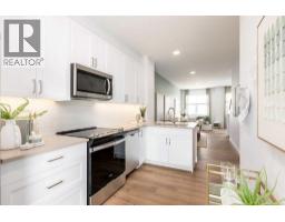 106, 272 Heirloom Crescent SE - photo 2