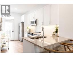 106, 272 Heirloom Crescent SE - photo 1