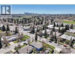 Family room - 29 Chisholm Crescent Nw, Calgary, AB T2L0Y9 Photo 14