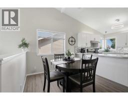 Living room - 148 Dempsey Street, Red Deer, AB T4R2Y9 Photo 6