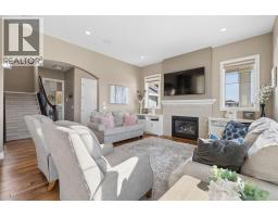 Family room - 31050 Woodland View, Rural Rocky View County, AB T3R1G3 Photo 6