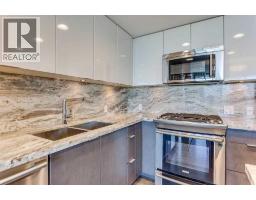 Bedroom - 1404, 519 Riverfront Avenue Se, Calgary, AB T2G1K6 Photo 6