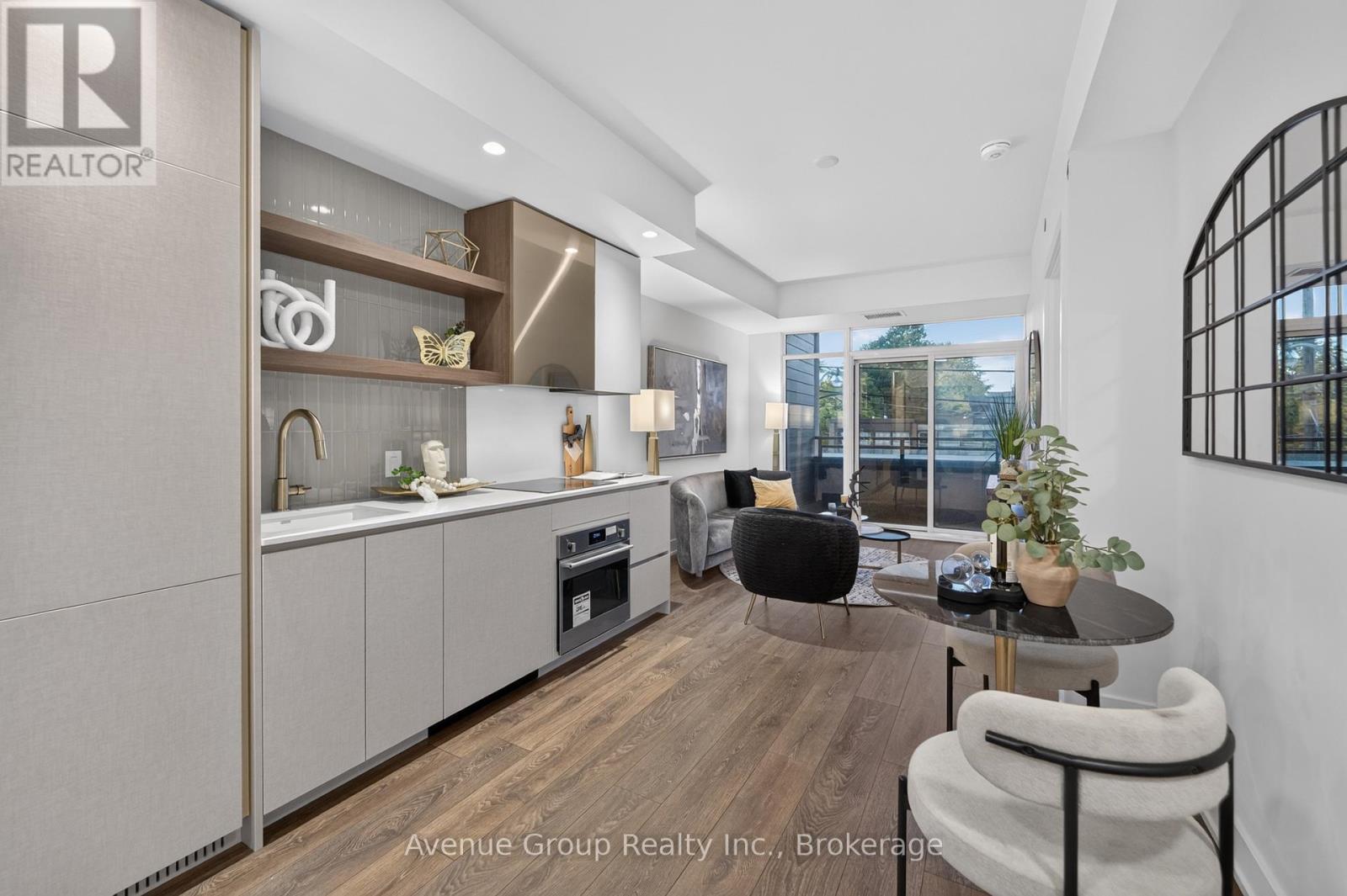 #202 1285 QUEEN STREET E - 1