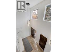 Living room - 826 Coventry Drive Ne, Calgary, AB T3K4G2 Photo 9