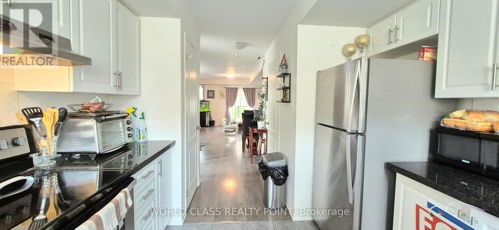# 222 - 2458 ROSEDROP PATH, Oshawa (Windfields) — photo 4